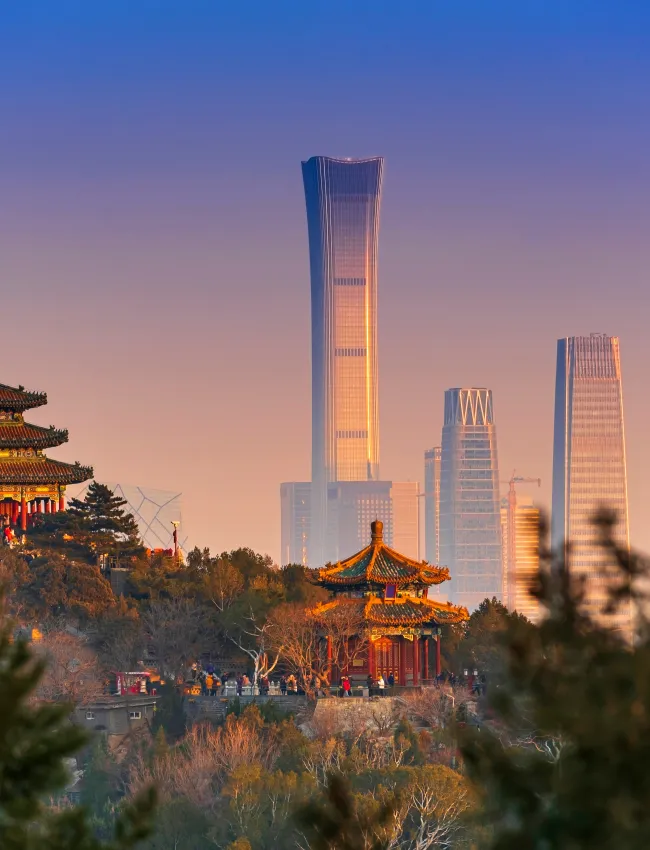 Beijing Sunset Beijing, China - Sunset Beijing cityscape between ancient Chinese architecture.